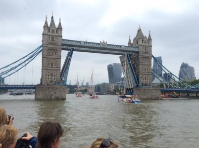 Photograph of Tower Bridge open to allow the boats to pass